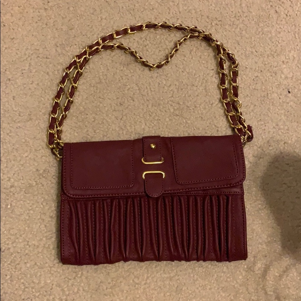 Burgundy pleated clutch/shoulder bag